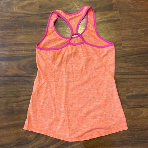 2 piece workout tops. One size small and one medium. - Picture 4 of 7